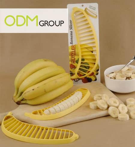 https://www.theodmgroup.com/wp-content/uploads/2012/12/Promo-Gift-Banana-Slicer.jpg
