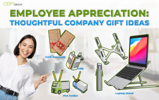 Various company gifts for employees including a cork notebook, USB, pen holder, and laptop stand by ODM Group.