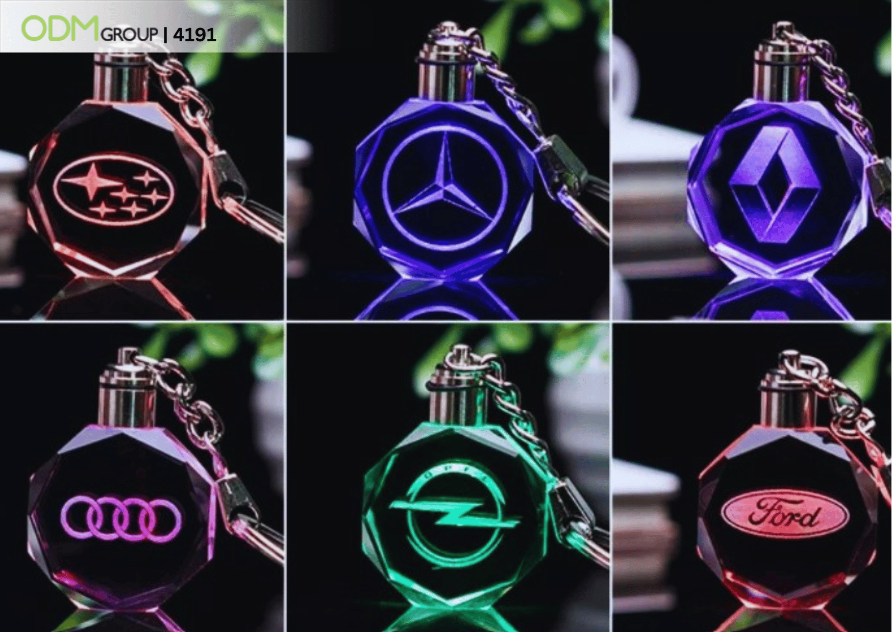 Illuminated keychains with various car brand logos.