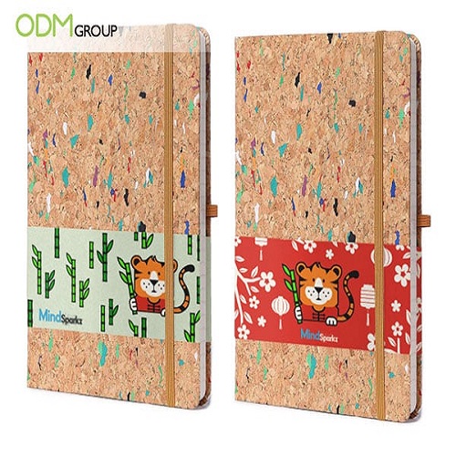 Two cork notebooks with cute animal designs by ODM Group.