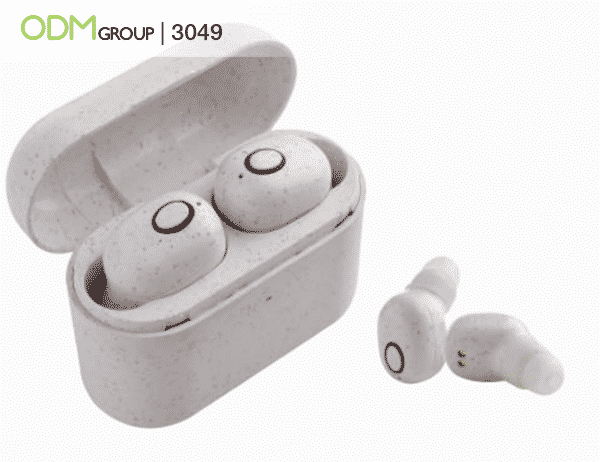 White promotional earbuds in a case by ODM Group.