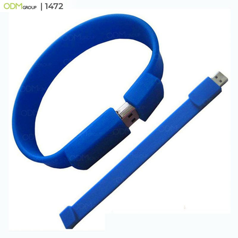 Blue silicone bracelet with a USB flash drive.