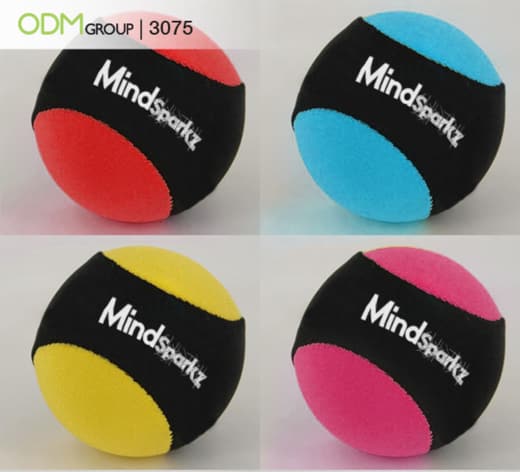 Colorful stress balls with "MindSparkz" logo.