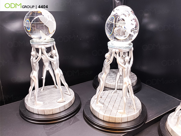 Elegant custom crystal awards featuring a globe design.