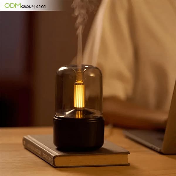 Aromatherapy diffuser with warm ambient light.