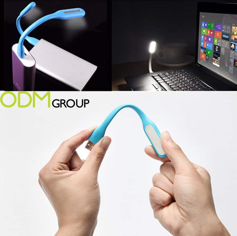 Flexible USB light being used with a laptop.