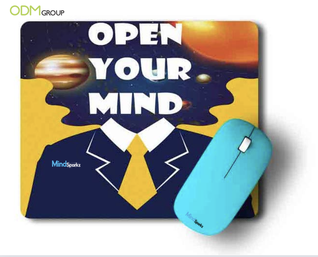 Mouse pad with the quote "Open Your Mind" and a matching blue mouse - Motivational Quotes for Employees from Managers