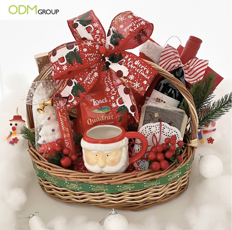 Luxurious Christmas-themed gift basket with festive ribbon.