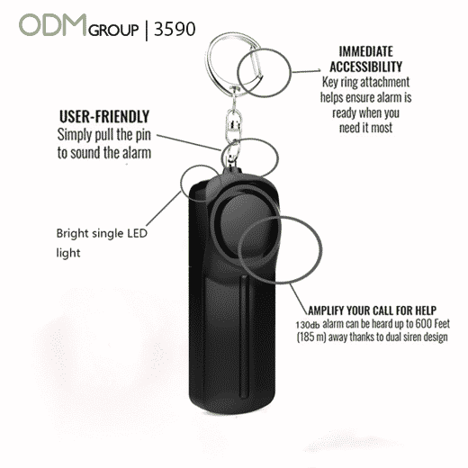 Black personal alarm keychain with safety features highlighted.