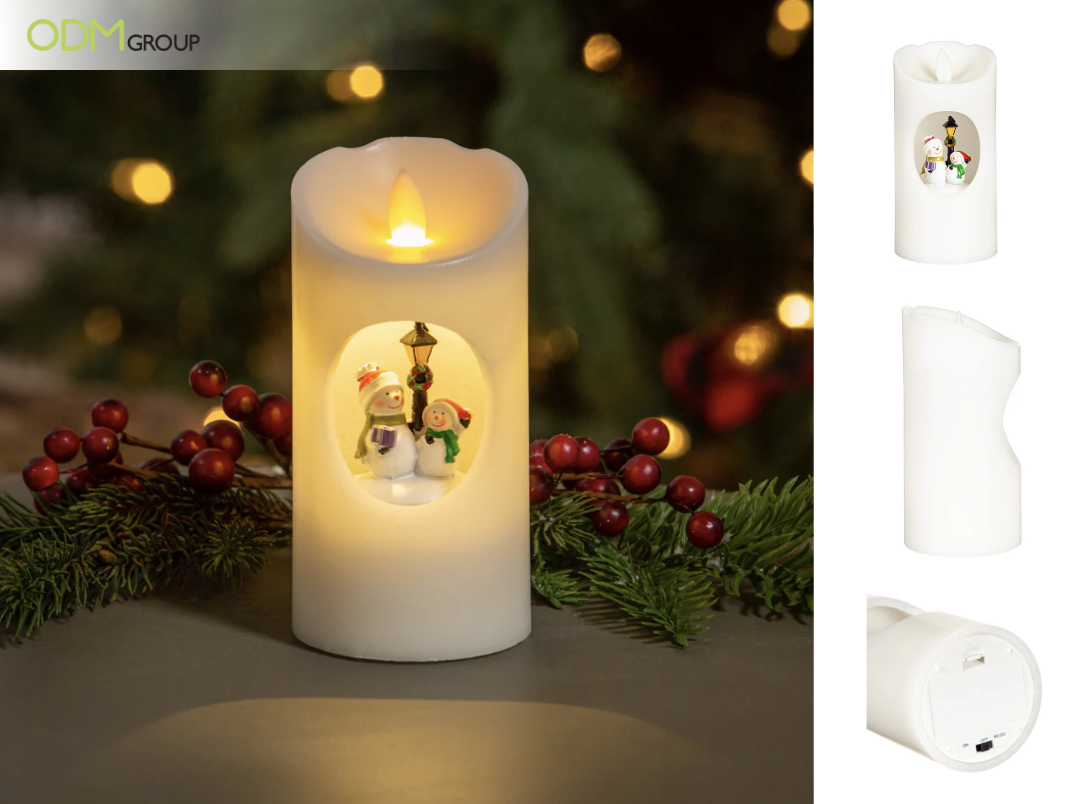 Christmas-themed scented candle with snowman design.