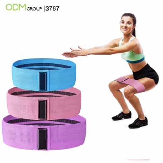 Woman using fitness resistance bands.